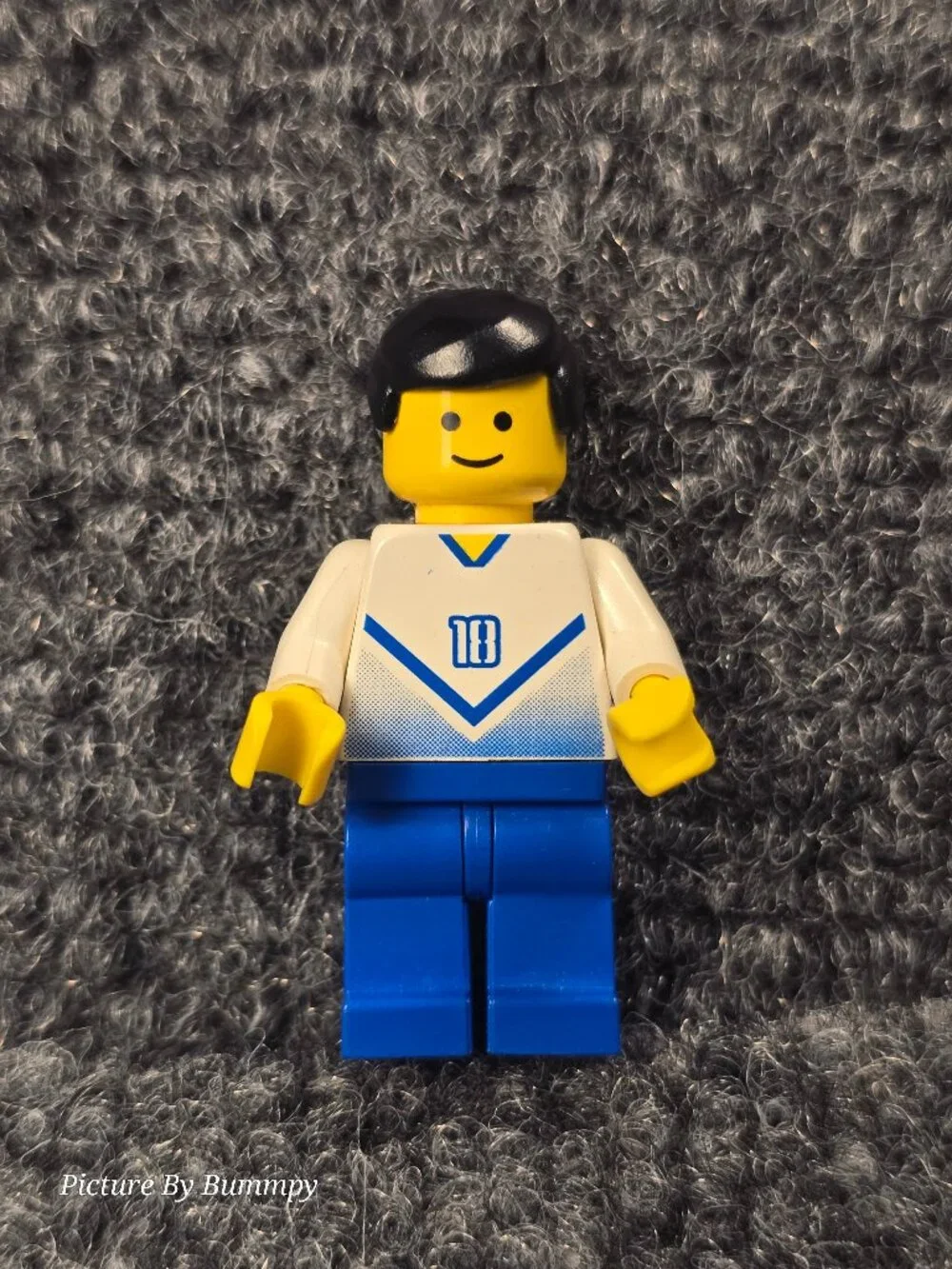 LEGO minifigure is a soccer player from the 2002 Sports